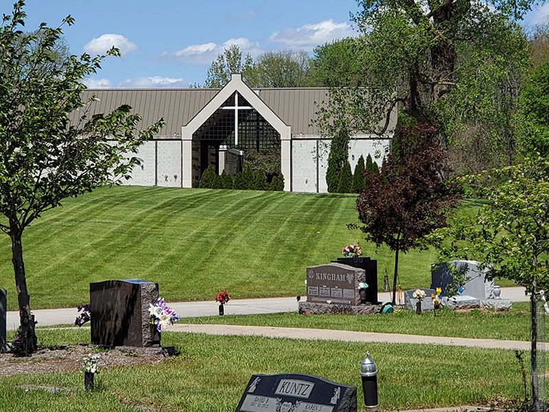 View of chapel from distance over headstones