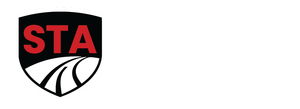 A black shield-shaped logo featuring the red letters