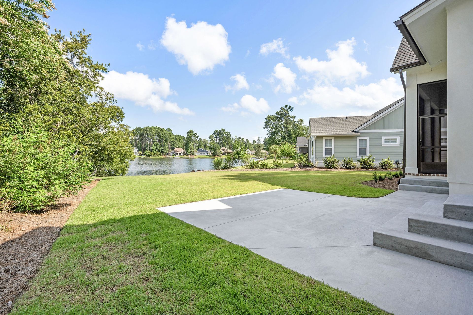 Hampton Lake Contemporary Stucco Custom Home Kendrick Design-Build Bluffton South Carolina