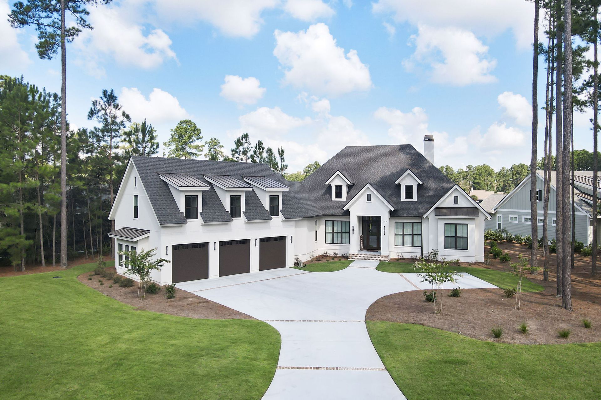 Hampton Lake Contemporary Stucco Custom Home Kendrick Design-Build Bluffton South Carolina