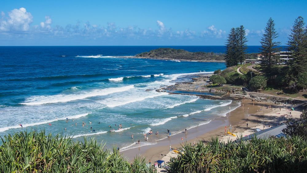 A Beach With a Lot of People — Jaya Rose Earthworks and Landscape Contractors In Yamba, NSW