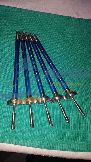 Five blue-handled hand tools with metal shafts and flat heads laid on a green mat.