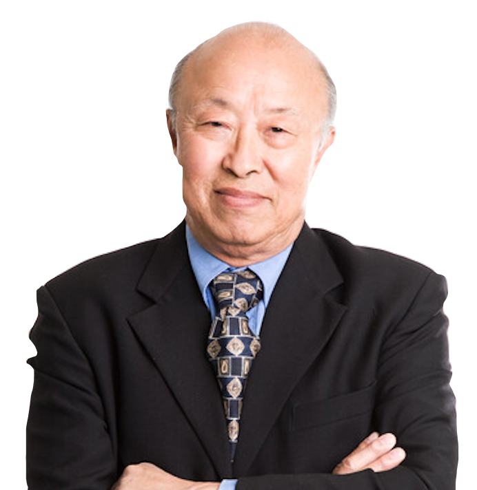 Asian man in suit with arms crossed, smiling.