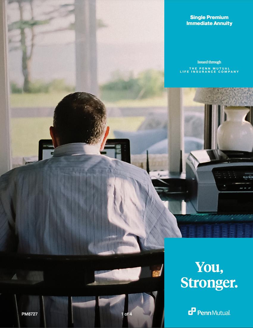 Man working on laptop at desk in a bright room. Text reads 