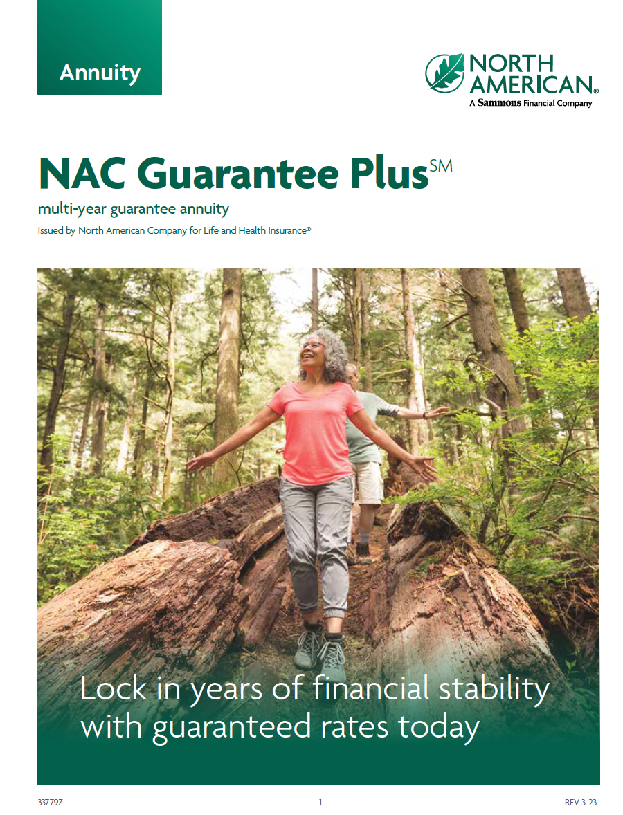 Two people walking on a fallen tree trunk in a forest. The cover advertises an annuity.