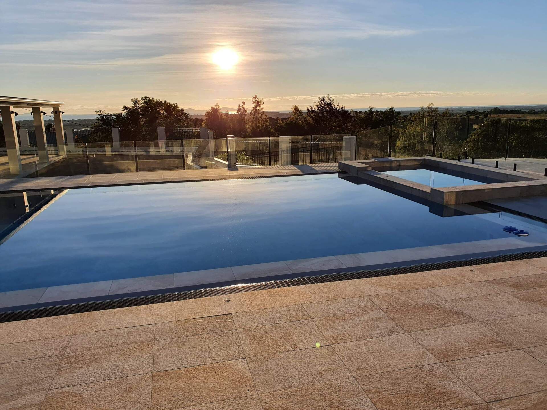 Large Swimming Pool With Hot Tub in large Backyard — Doug Allen Pools In Beaconsfield, QLD
