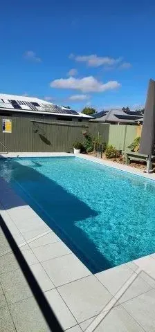 A Swimming Pool The Backyard — Doug Allen Pools In Beaconsfield, QLD