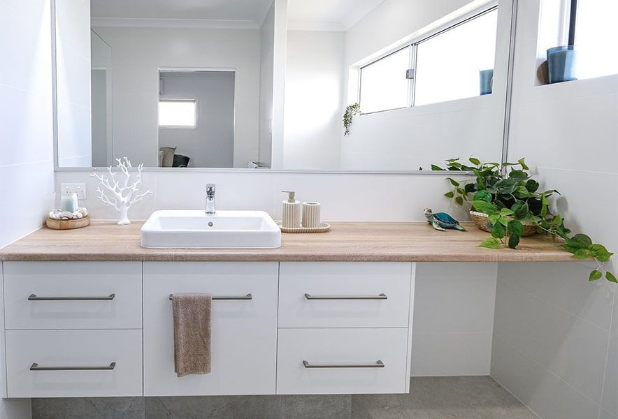 Modern White Bathroom Vanity with Double Sink — Bundy Homes in Bundaberg North, QLD