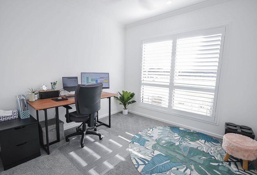 Bright Home Office with Dual Monitors — Bundy Homes in Bundaberg North, QLD