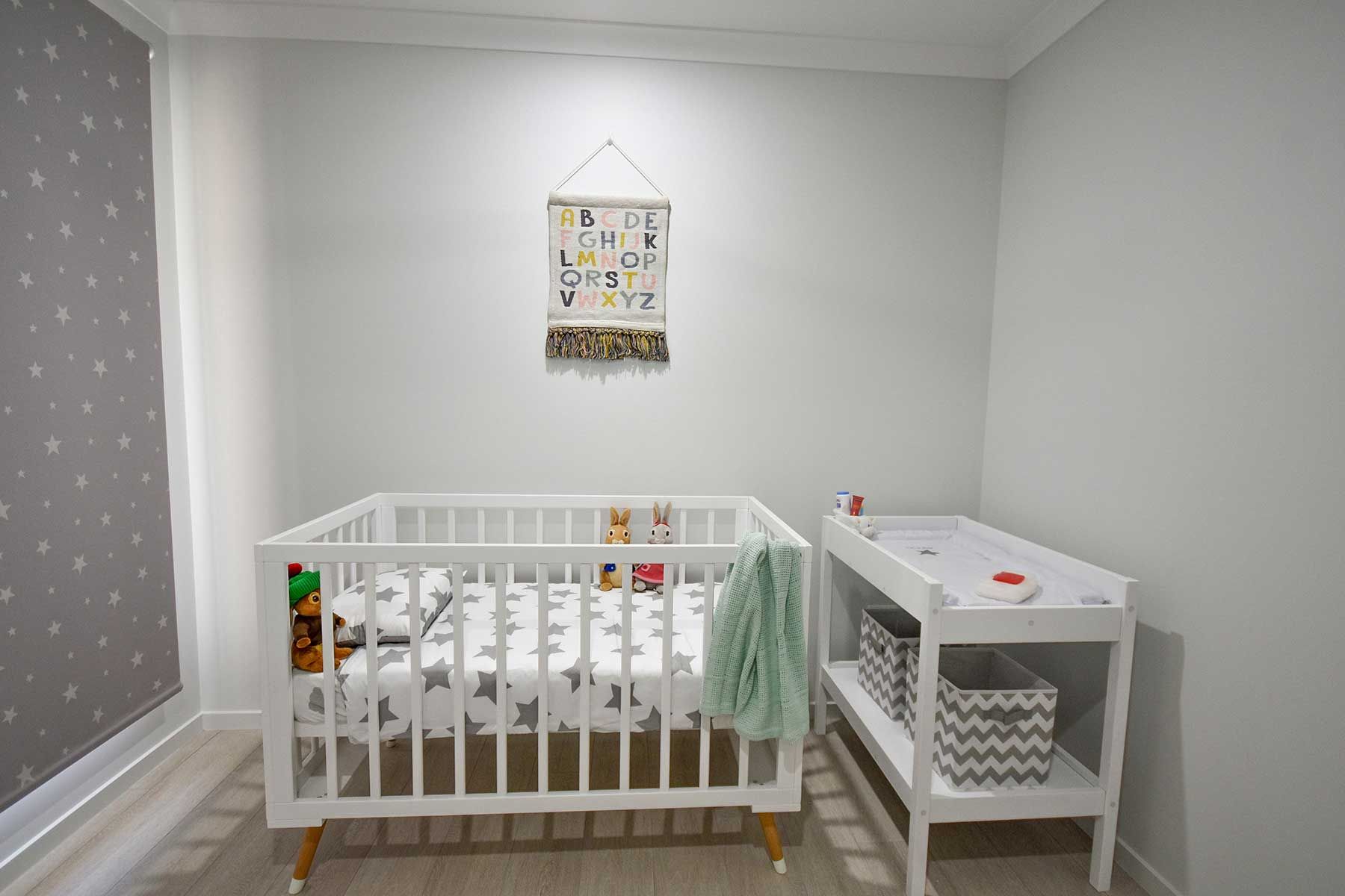 Minimalist Nursery with White Crib — Bundy Homes in Bundaberg North, QLD