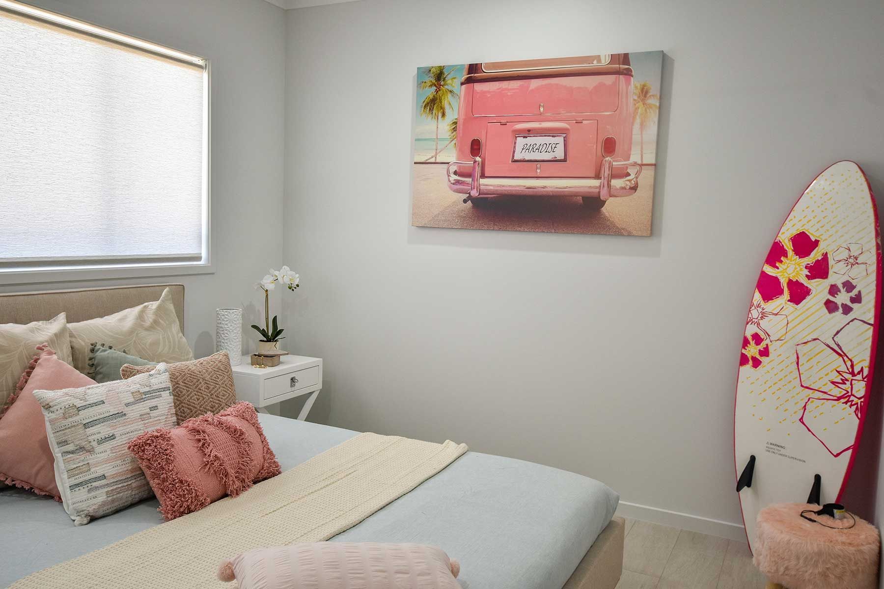 Cozy Bedroom with Pink Pillows — Bundy Homes in Bundaberg North, QLD