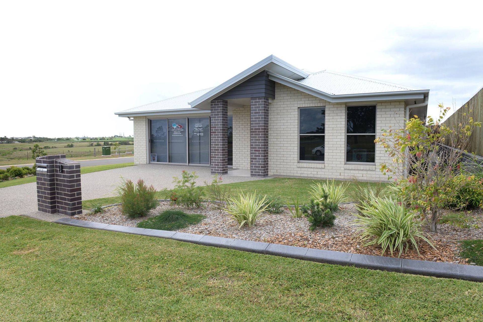Modern Single-Story House with Stone Accents — Bundy Homes in Bundaberg North, QLD