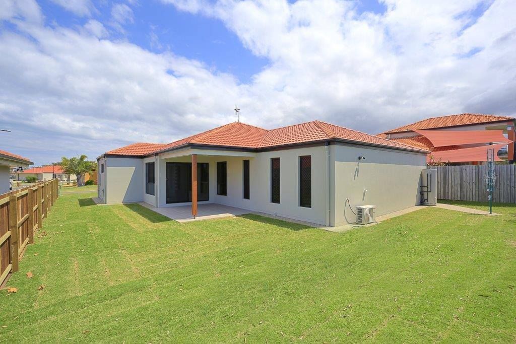 Single-Story House with Red Tile Roof — Bundy Homes in Bundaberg North, QLD