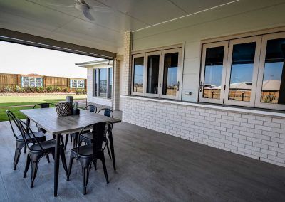 Covered Patio with A Table and Chairs — Bundy Homes in Bundaberg North, QLD