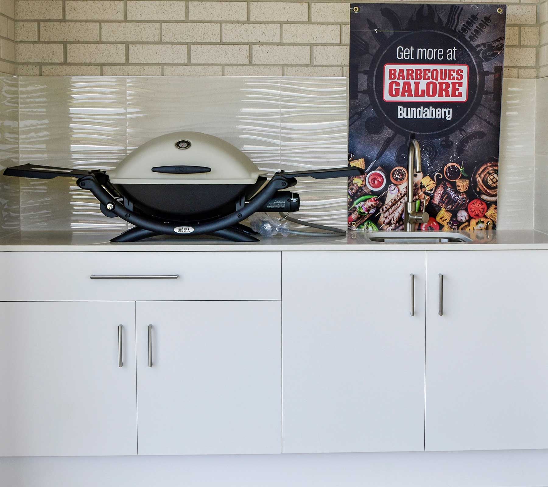 Kitchen Counter with A Black Grill — Bundy Homes in Bundaberg North, QLD