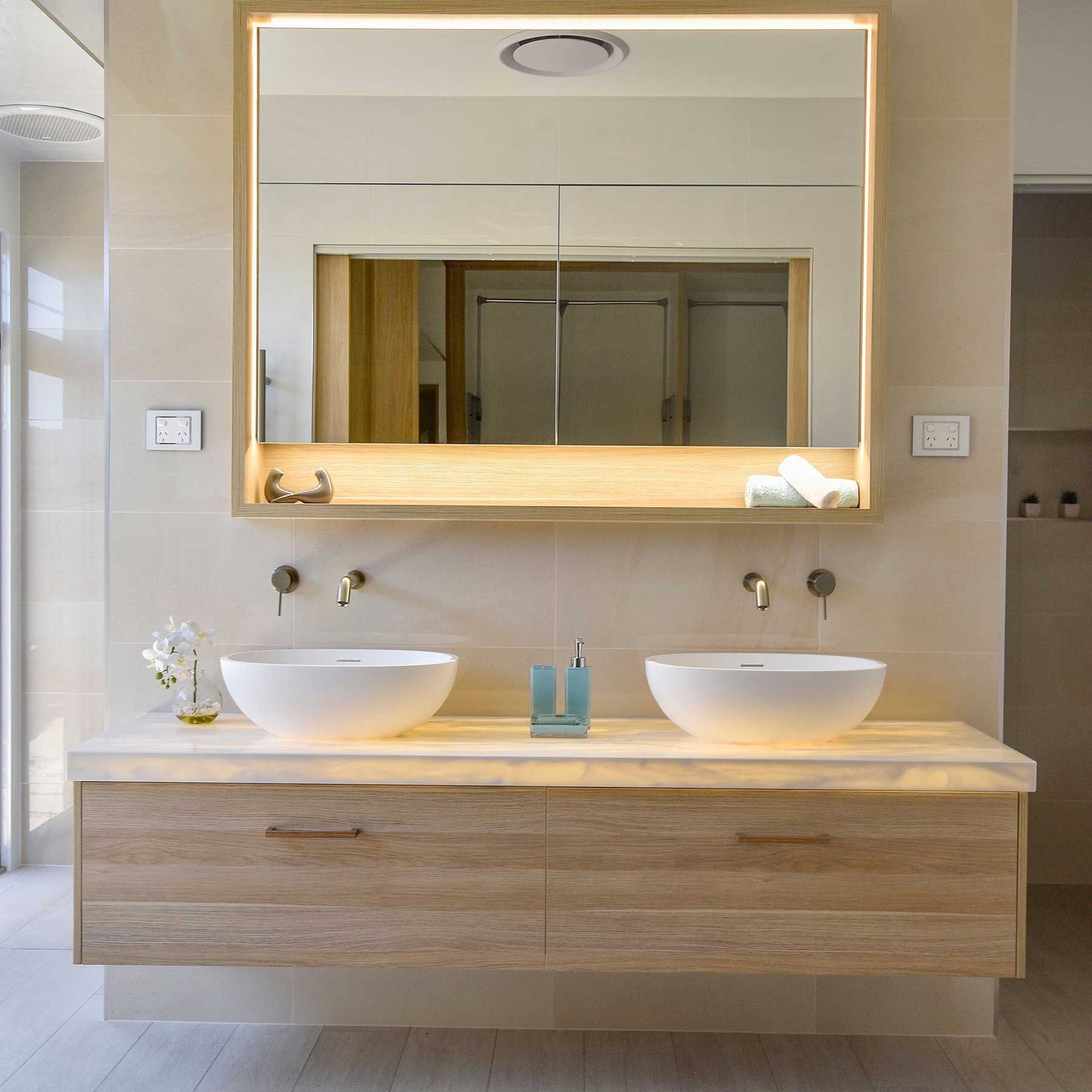 Modern Bathroom Vanity with Two Round Sinks — Bundy Homes in Bundaberg North, QLD