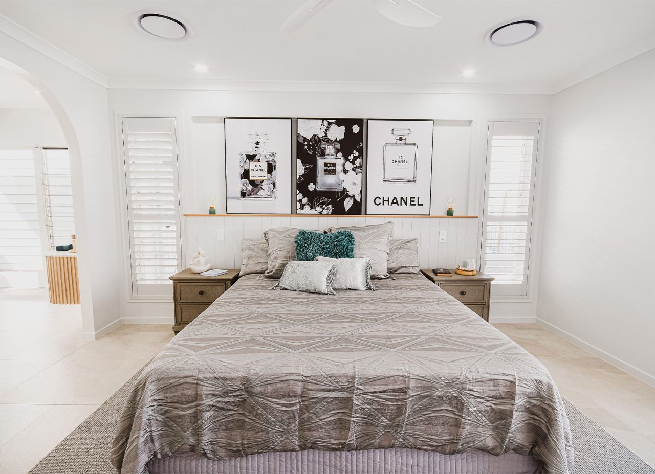 Bright Modern Bedroom with A Bed — Bundy Homes in Bundaberg North, QLD
