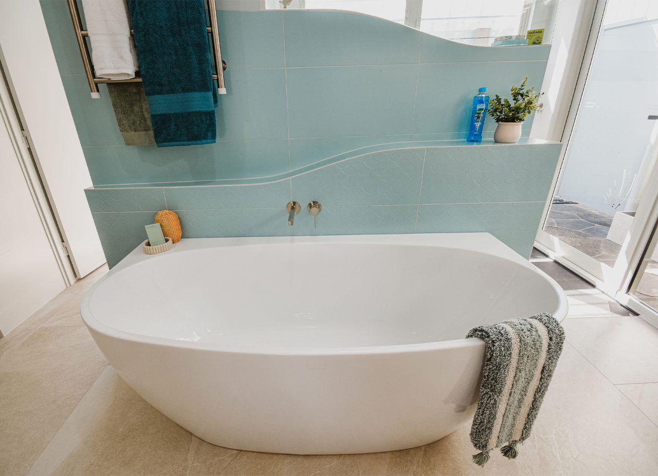 Modern Bathroom with A White Freestanding Tub — Bundy Homes in Bundaberg North, QLD