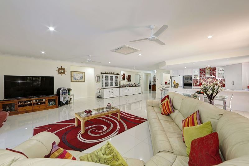 Bright Open Living Room with Cream Sofas — Bundy Homes in Bundaberg North, QLD