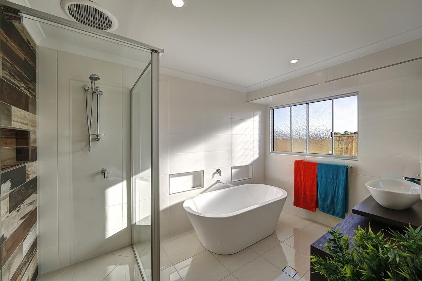 Bright Bathroom with Glass Shower — Bundy Homes in Bundaberg North, QLD