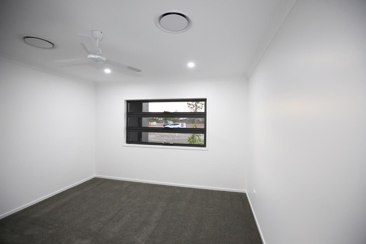 Empty White Room with Gray Carpet — Bundy Homes in Bundaberg North, QLD