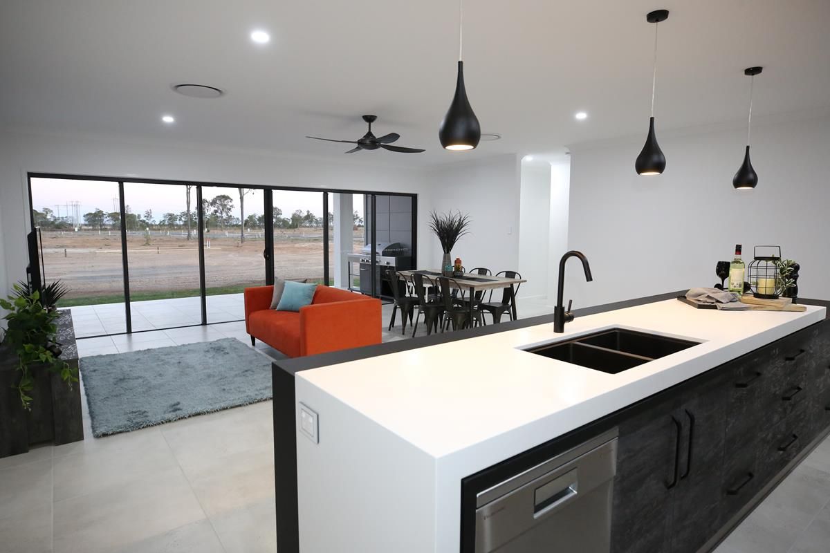 Modern Open-Plan Kitchen and Living Room — Bundy Homes in Bundaberg North, QLD