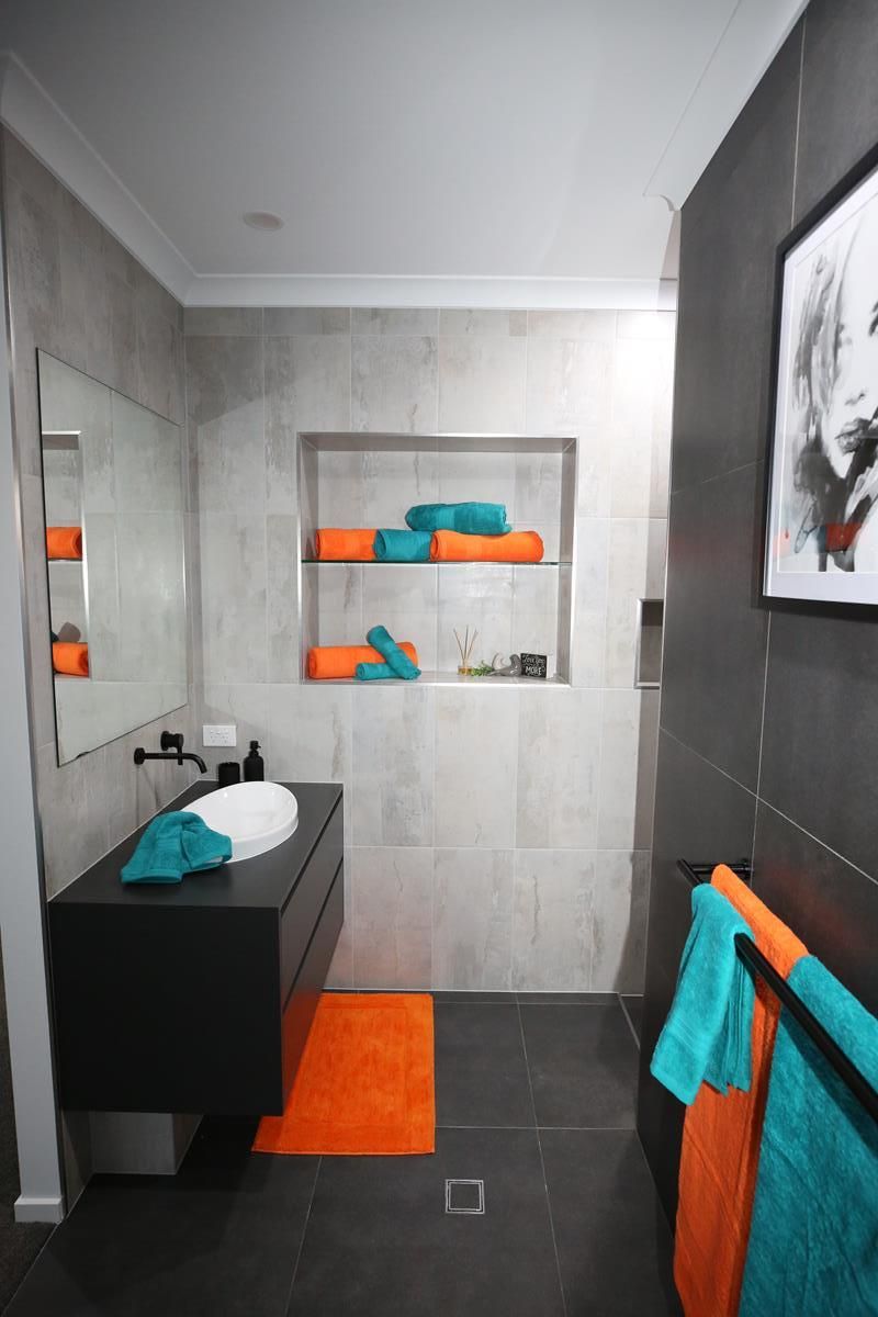 Modern Bathroom with Gray Tile — Bundy Homes in Bundaberg North, QLD