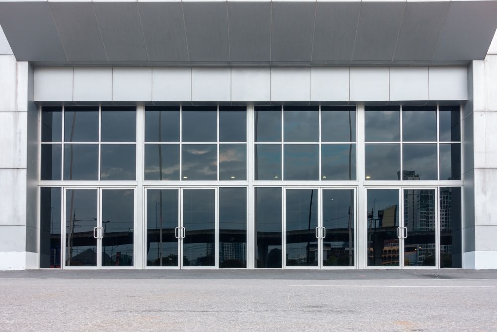 A Large Building with A Lot of Windows and Doors — Croker Building Solutions In Myrtleville, NSW