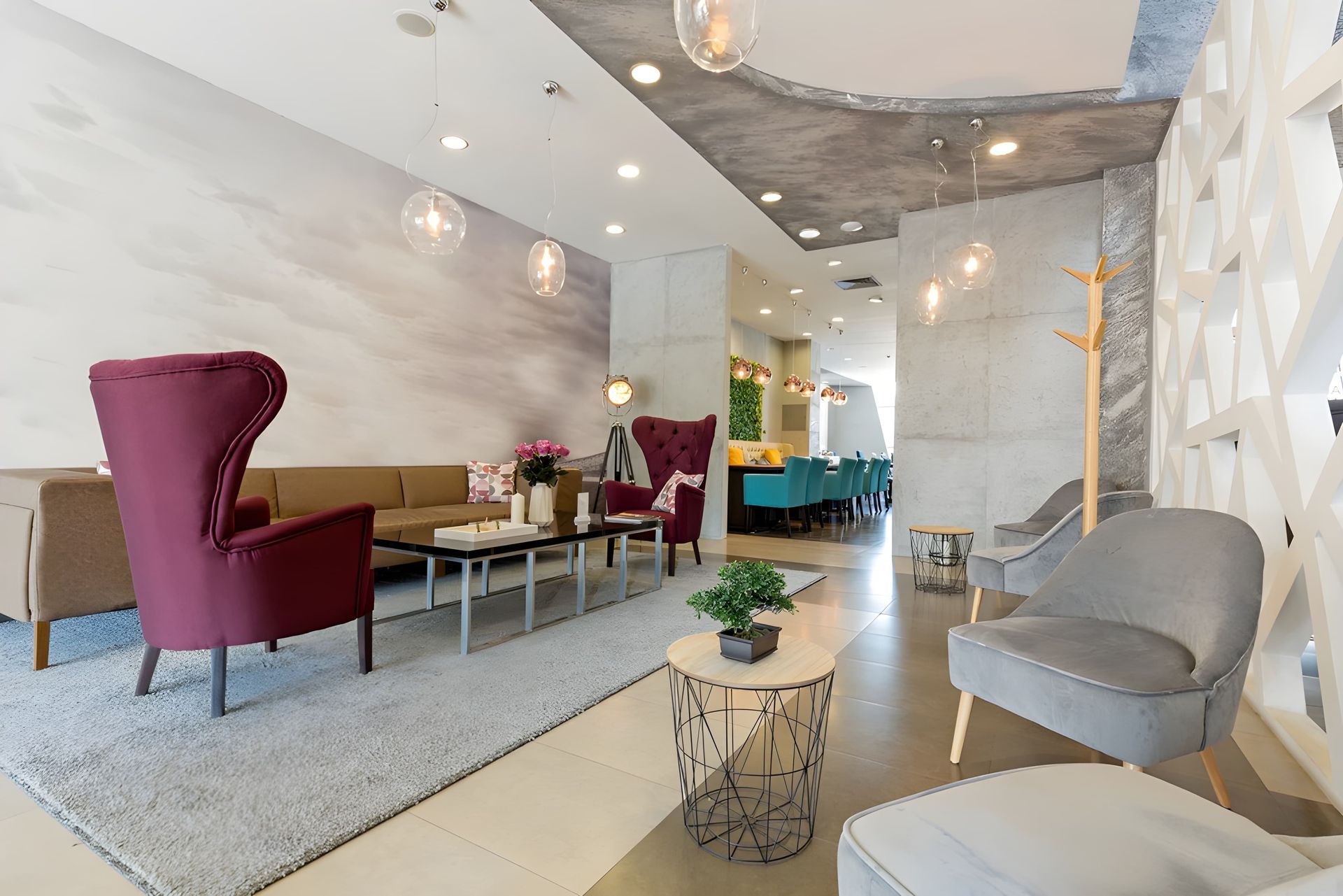 A Commercial Space Filled with Furniture and A Couch — Croker Building Solutions In Myrtleville, NSW