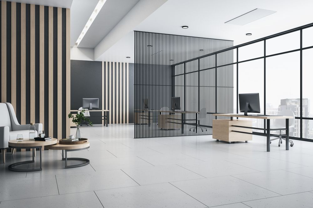 A Modern Office with A Lot of Windows and A Chair — Croker Building Solutions In Myrtleville, NSW