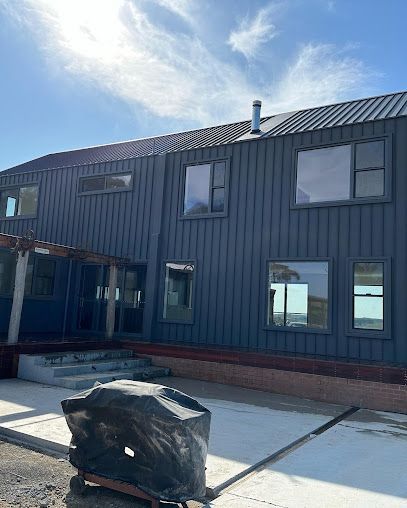 A large house with a lot of windows is being built. — Croker Building Solutions In Myrtleville, NSW