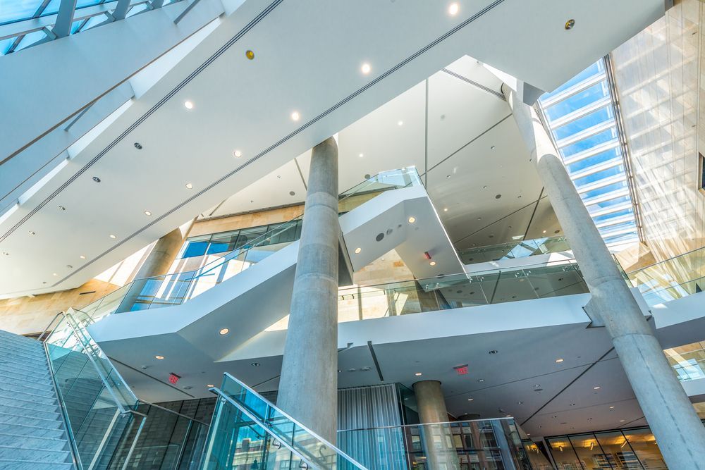 The Inside of A Large Building with Stairs and Columns — Croker Building Solutions In Myrtleville, NSW