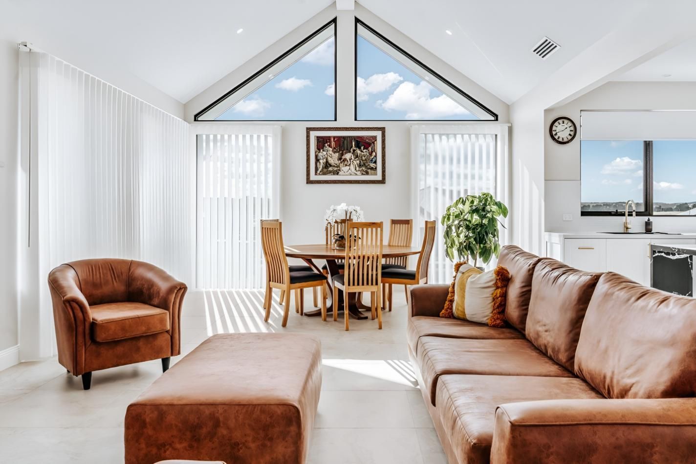Living Room With Brown Leather Furniture — Croker Building Solutions In Canberra, NSW