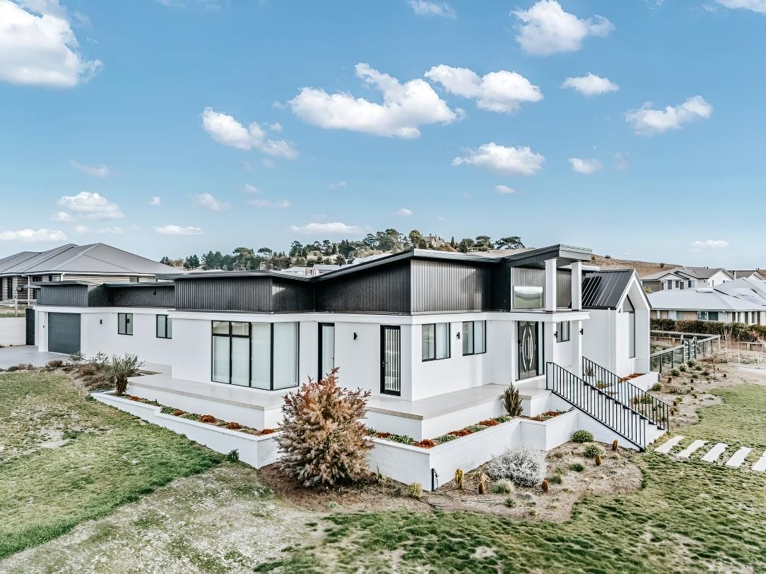Modern White House With Dark Accents — Croker Building Solutions In Myrtleville, NSW
