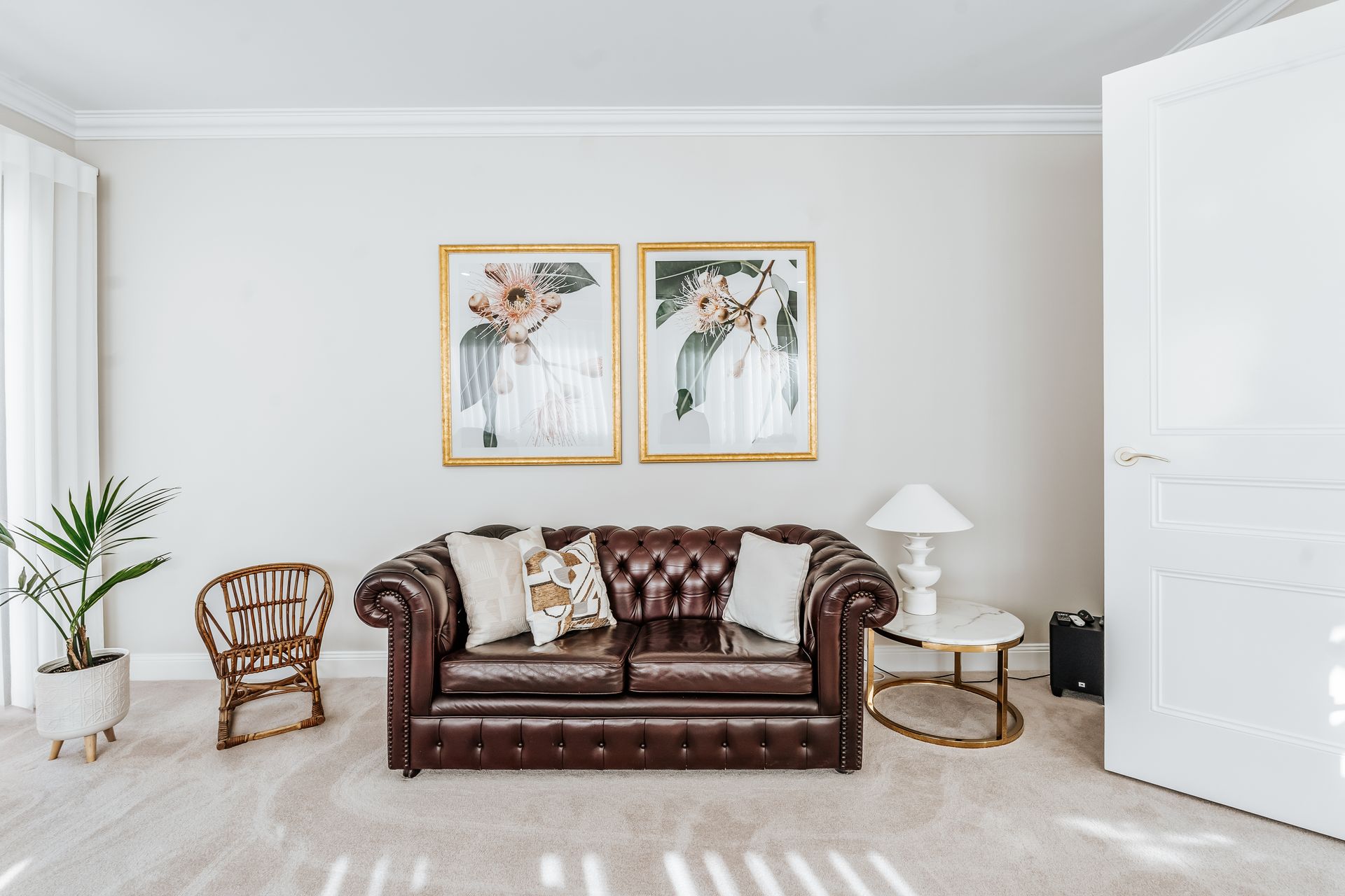 A Modern House with A Large Garage and A Lush Green Yard — Croker Building Solutions In Myrtleville, NSW