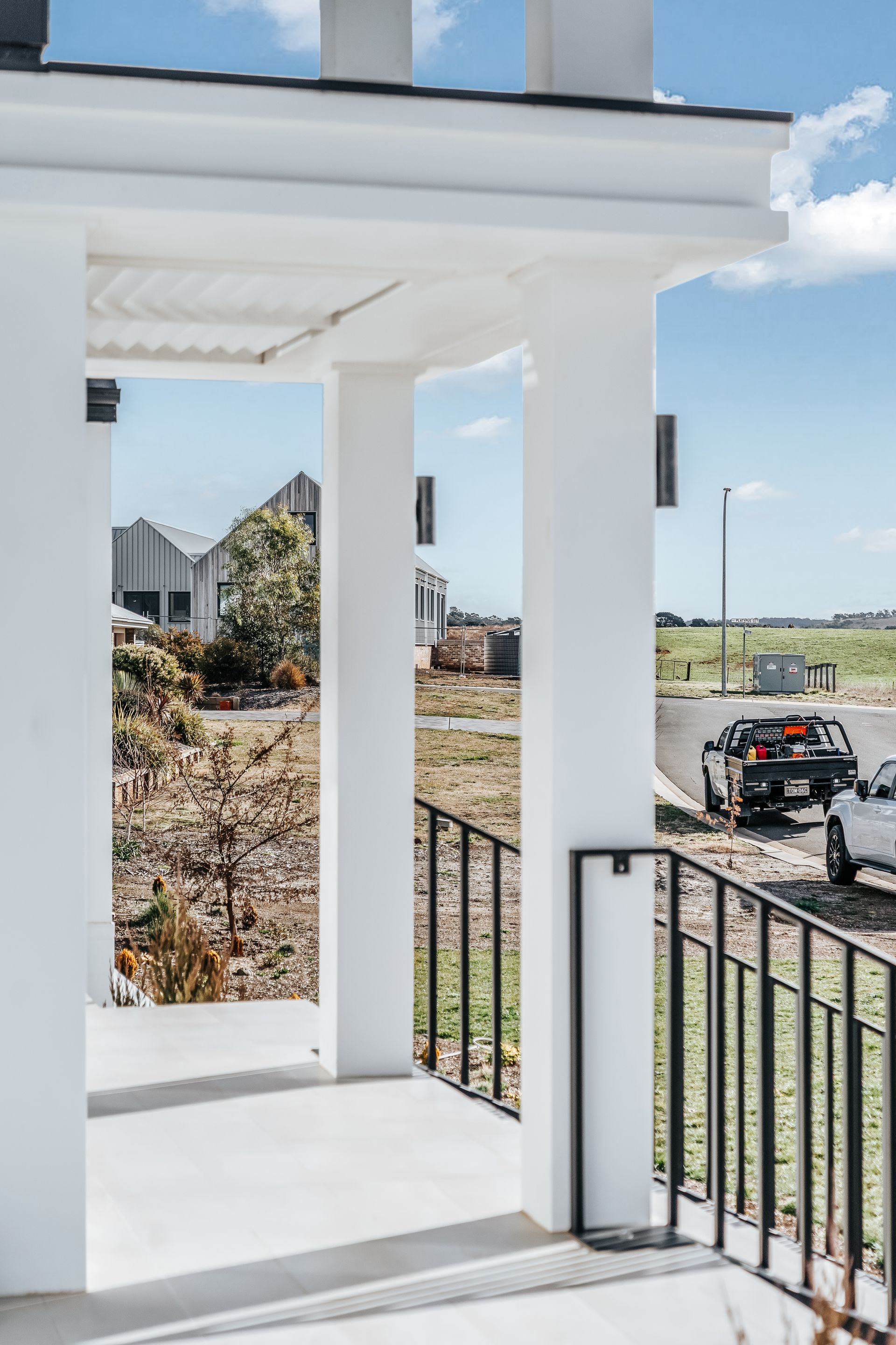 Front Deck With White Posts And Black Railing — Croker Building Solutions In Myrtleville, NSW