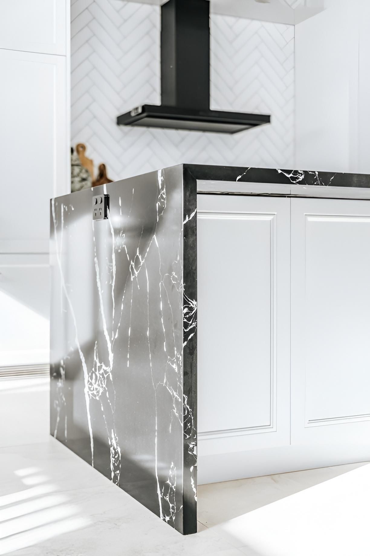 Modern Kitchen Island With a Black Marble Countertop — Croker Building Solutions In Myrtleville, NSW