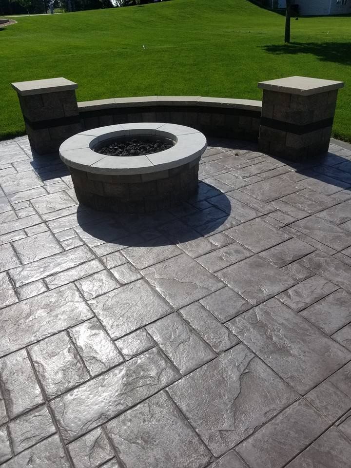 stamped concrete patio with firepit