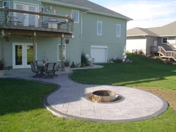 stamped concrete patio with firepit