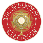 The True Presence Association logo has a picture of Jesus in the center