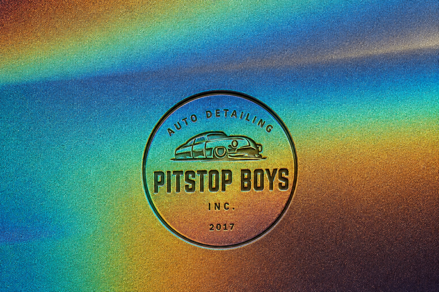 Colorful rainbow-gradient background with a circular Pitstop Boys logo in the center