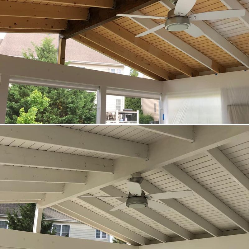 Covered patio ceiling with white beams, wood rafters, ceiling fan, and hanging outdoor light fixtures