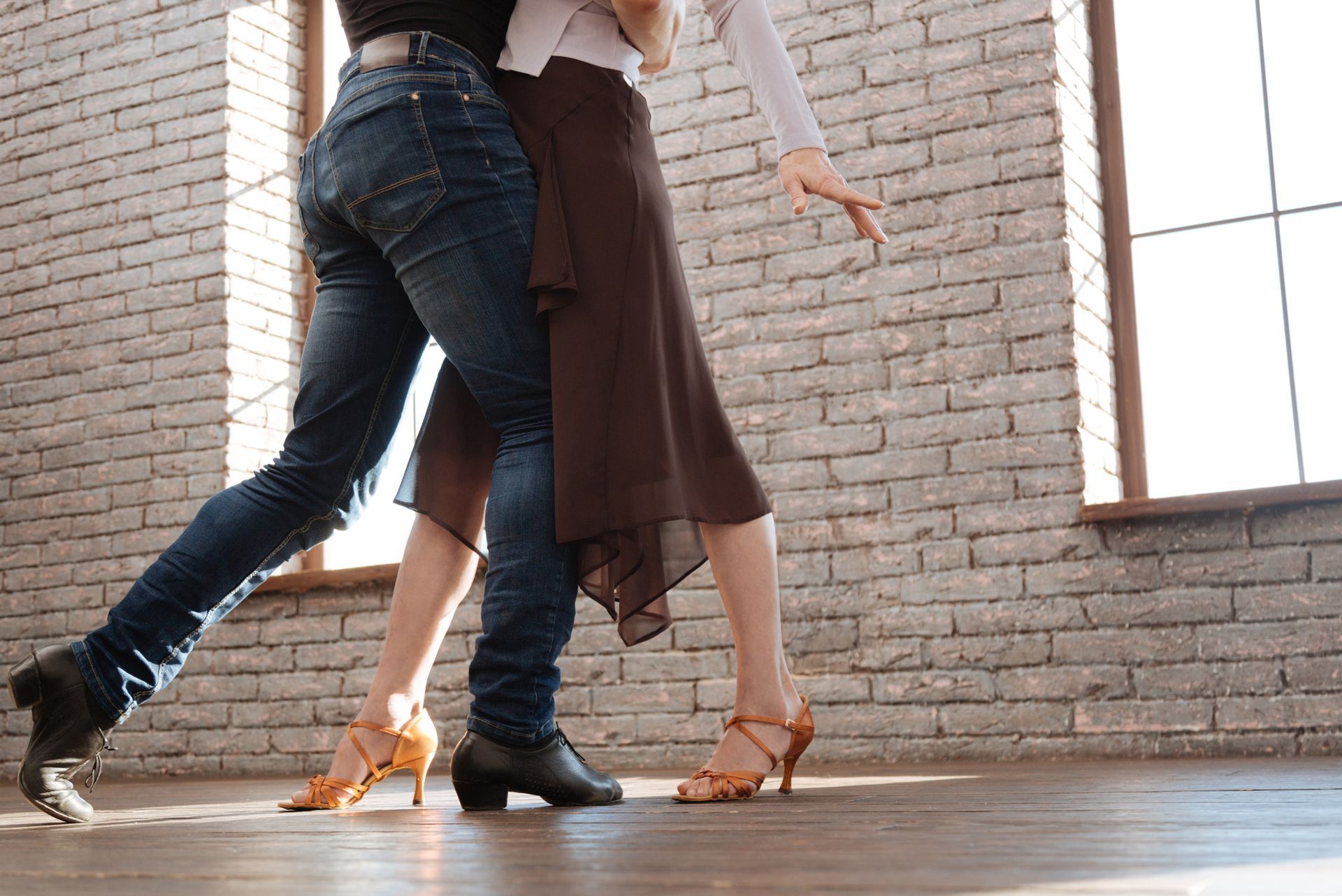 Two instructors from The Hive Ballroom providing professional ballroom dance lessons in Brandon, FL