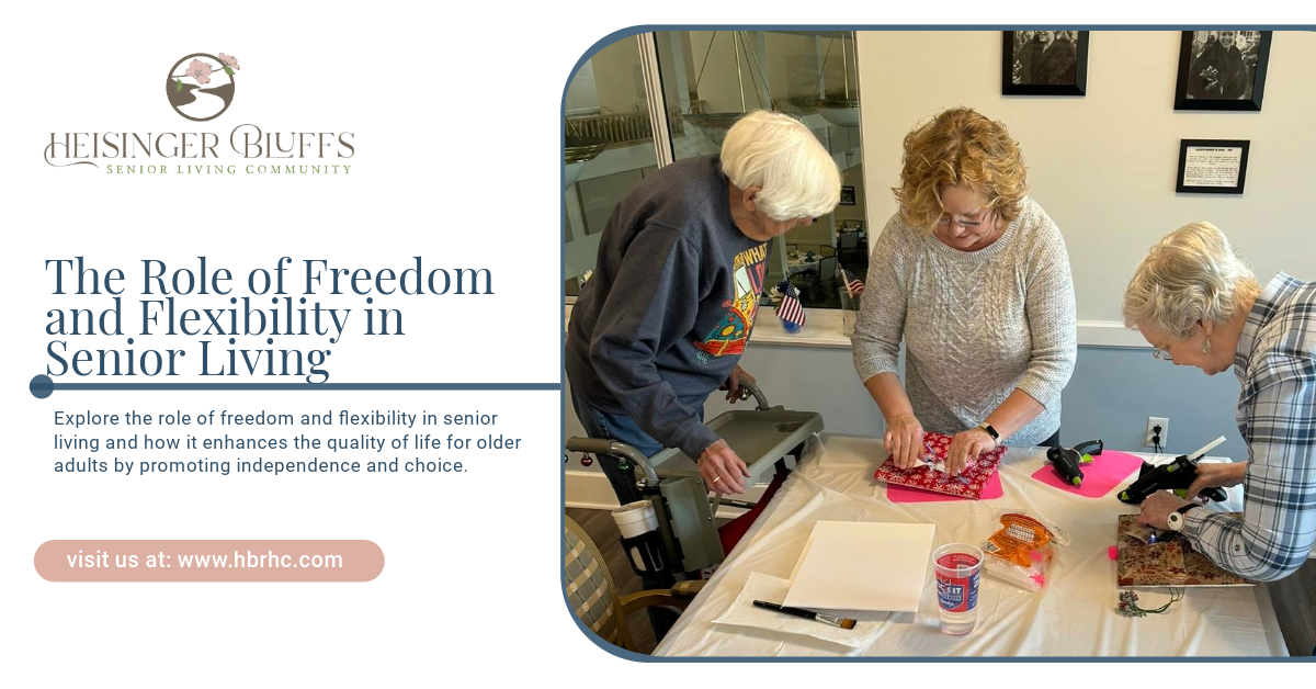 A group of elderly people is sitting around a table making crafts.