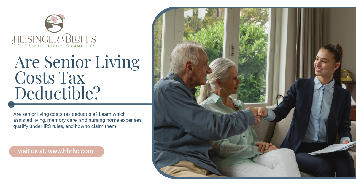 An accountant talking to an elderly couple in a living room