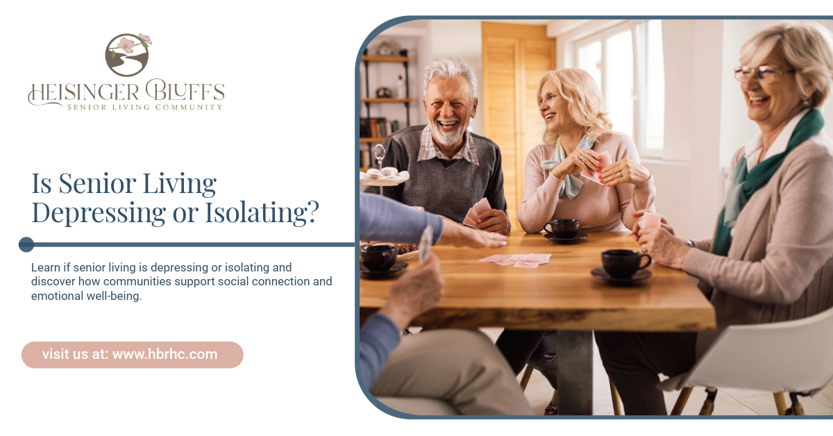 Four seniors laughing, gathered around a table with coffee cups.