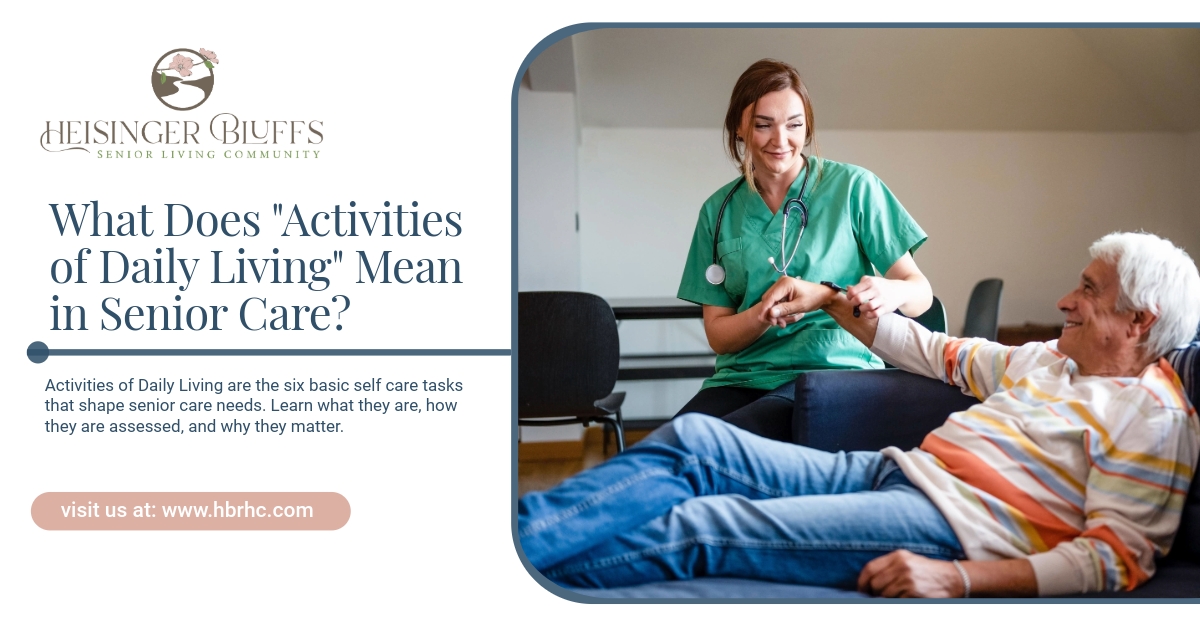 A senior care staff member assisting an elderly man lying on a couch