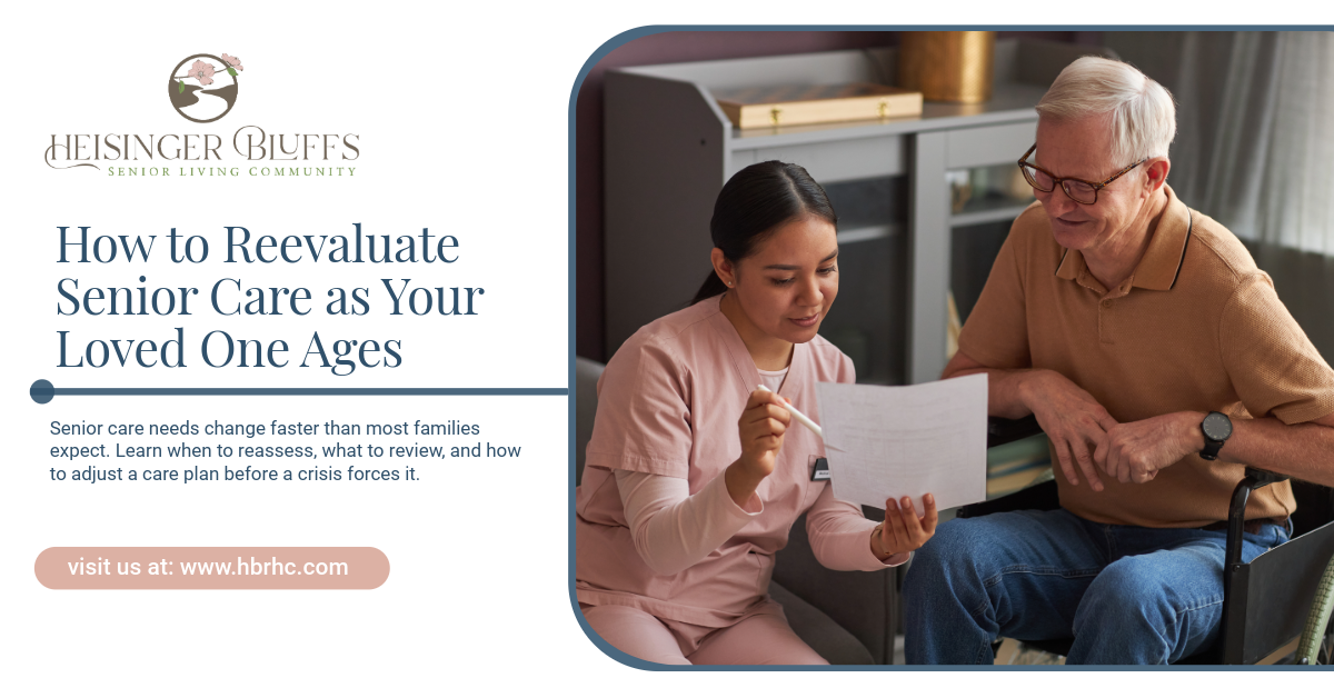 A caregiver reevaluating a care plan with a senior sitting in a wheelchair