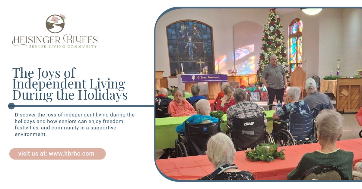 A group of elderly people are sitting at tables in front of a Christmas tree.