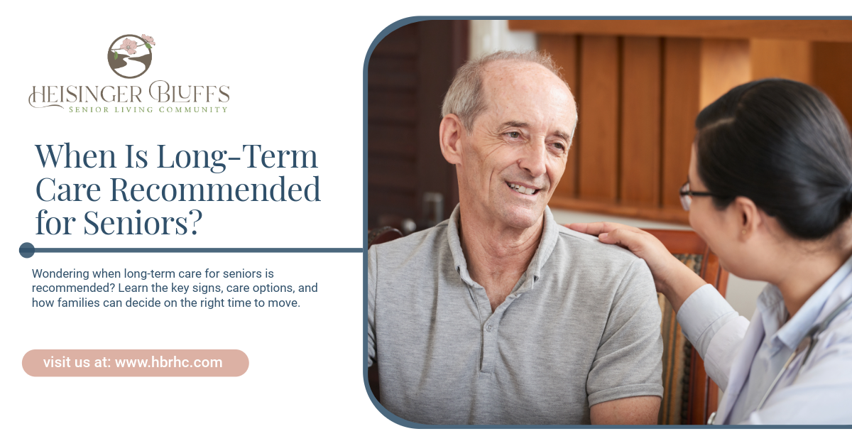 A senior talking to a senior care staff member